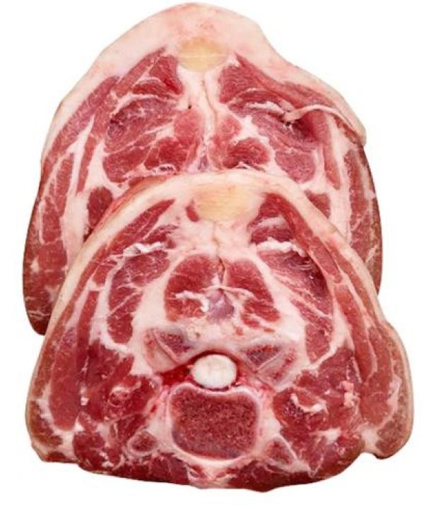Two pieces of Lamb Neck Chops (1lb) for sale, neatly arranged on a white background by the We Speak Meat Company.