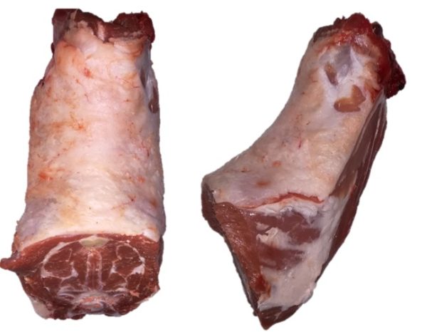 Buy yours now - two pieces of Lamb Neck Whole (1lb) on a white background from We Speak Meat Company.