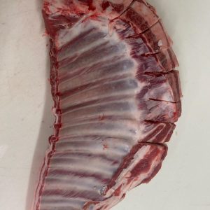 Buy yours now - a piece of Lamb Rib Whole (1lb) on a white surface.