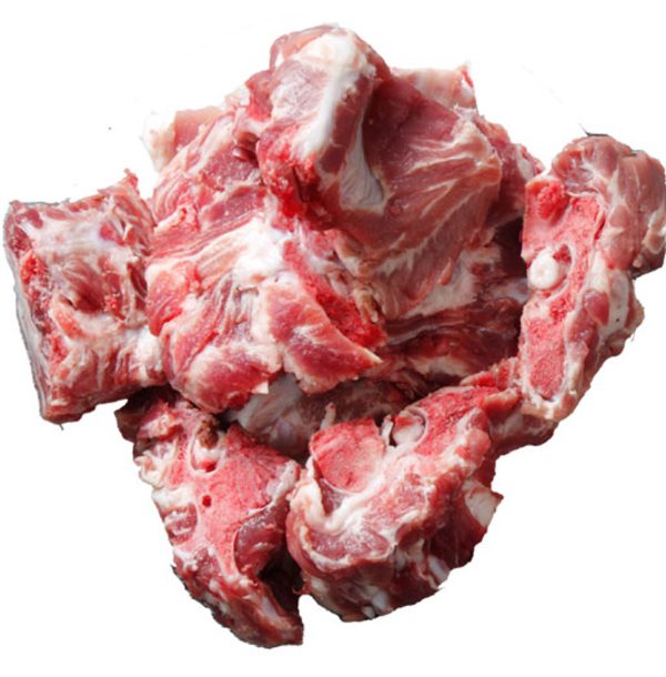 A pile of Pork Neck Bones (1lb) from We Speak Meat Company on a white background. Order yours now online.