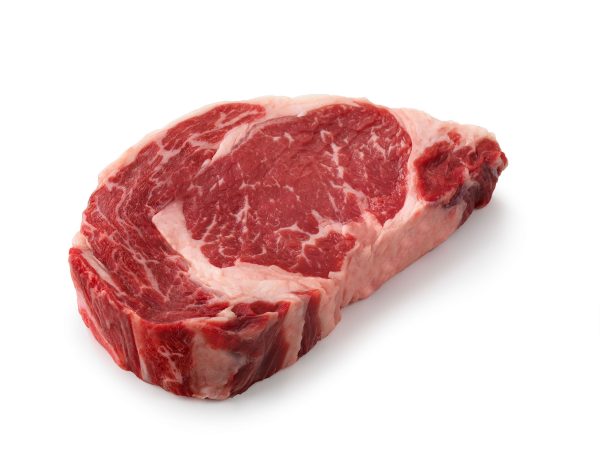 A farm-raised Ribeye Steak on a white background for sale by We Speak Meat Company.